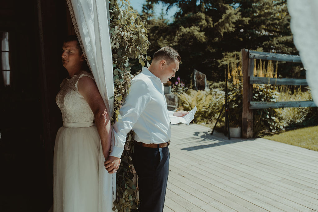 groom and groomsman holding hands