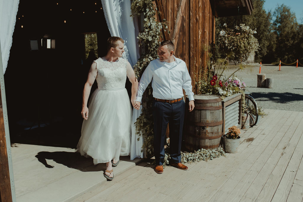 groom laughing with his groomsman
