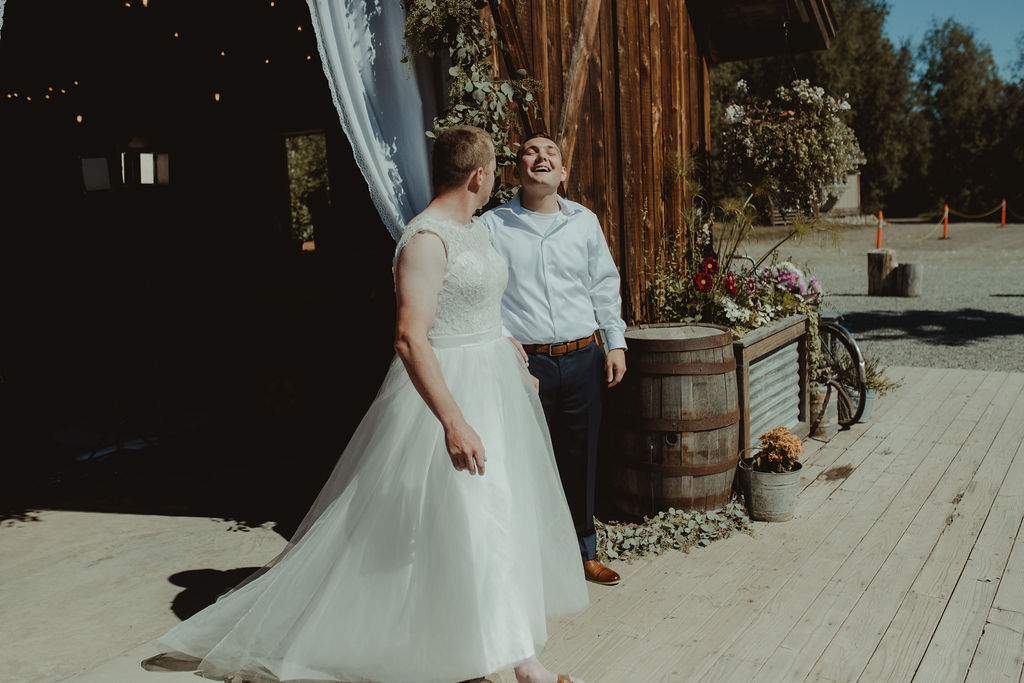 groom and groomsman at the rustic modern wedding