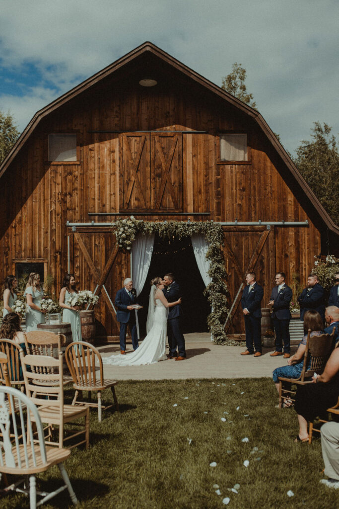 couple kissing after their ceremony