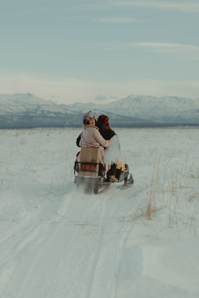 snowmobile wedding photos