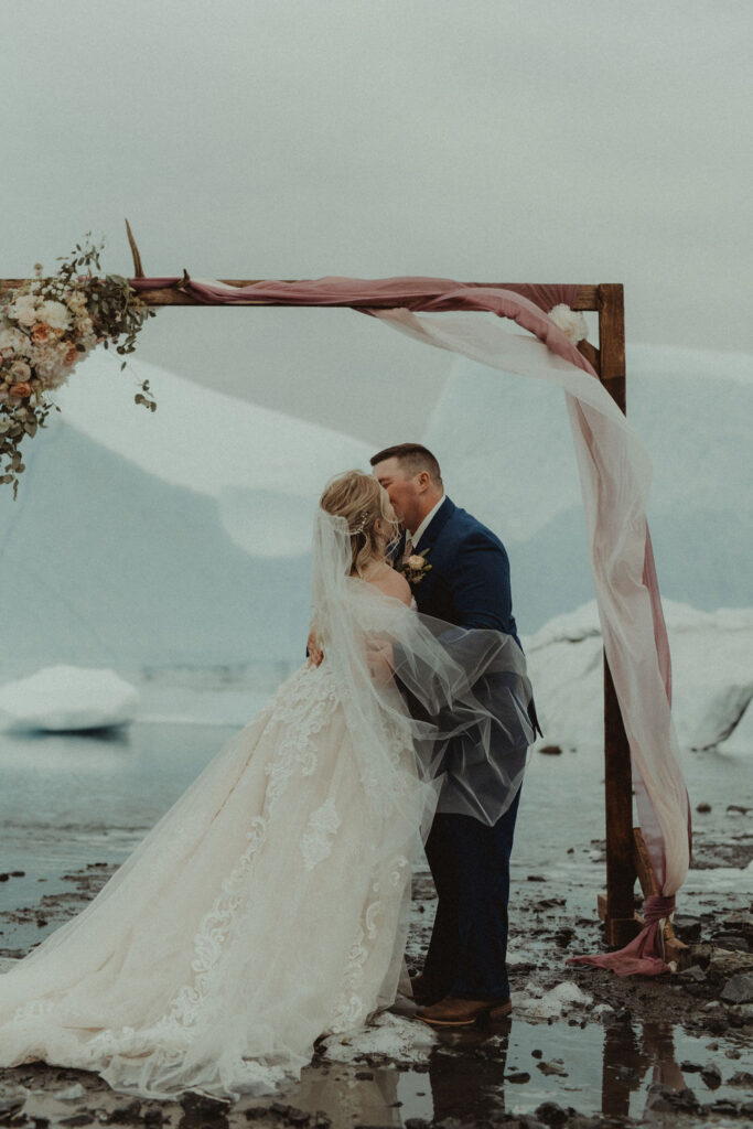 couple kissing after their ceremony 