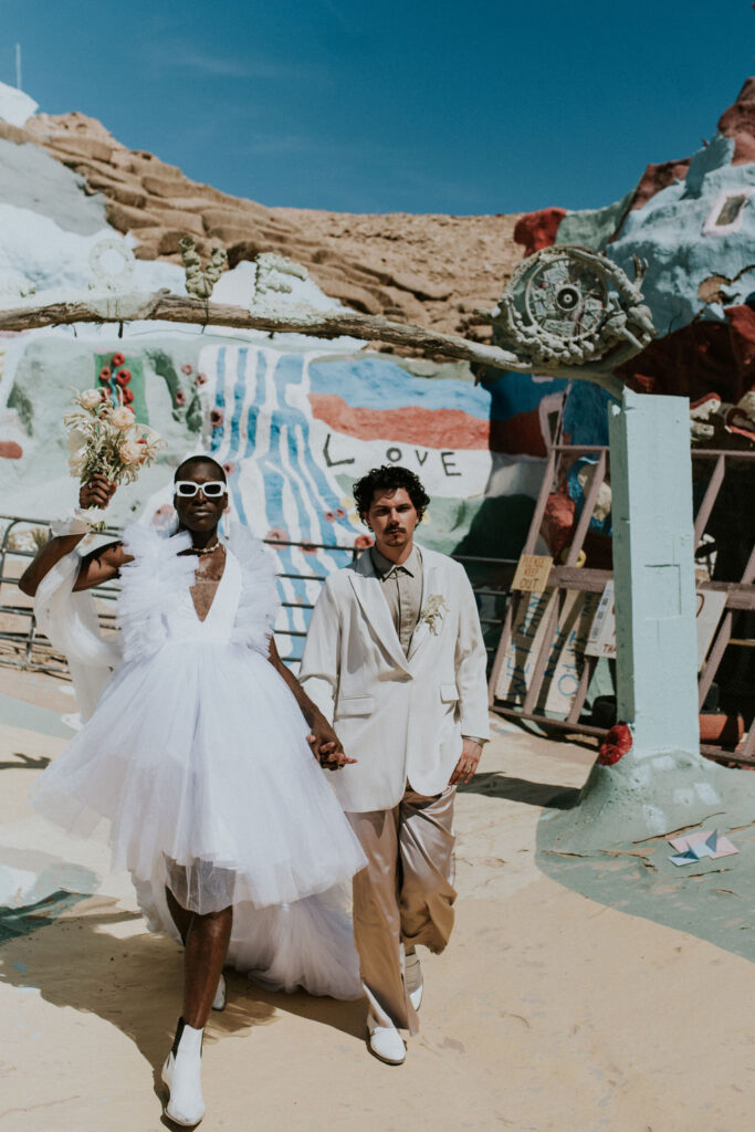 couple holding hands during their styled photoshoot