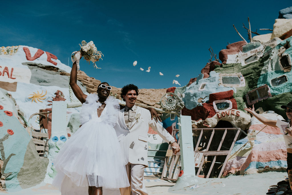 happy couple dancing during their photoshoot