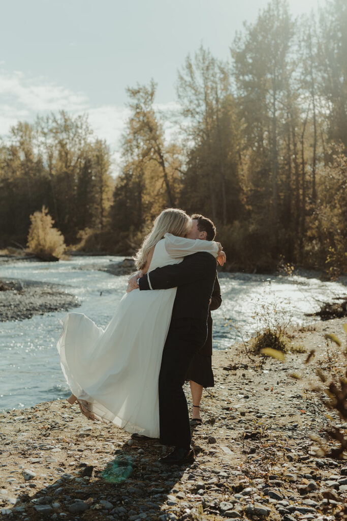 bride and groom kissing after their ceremony