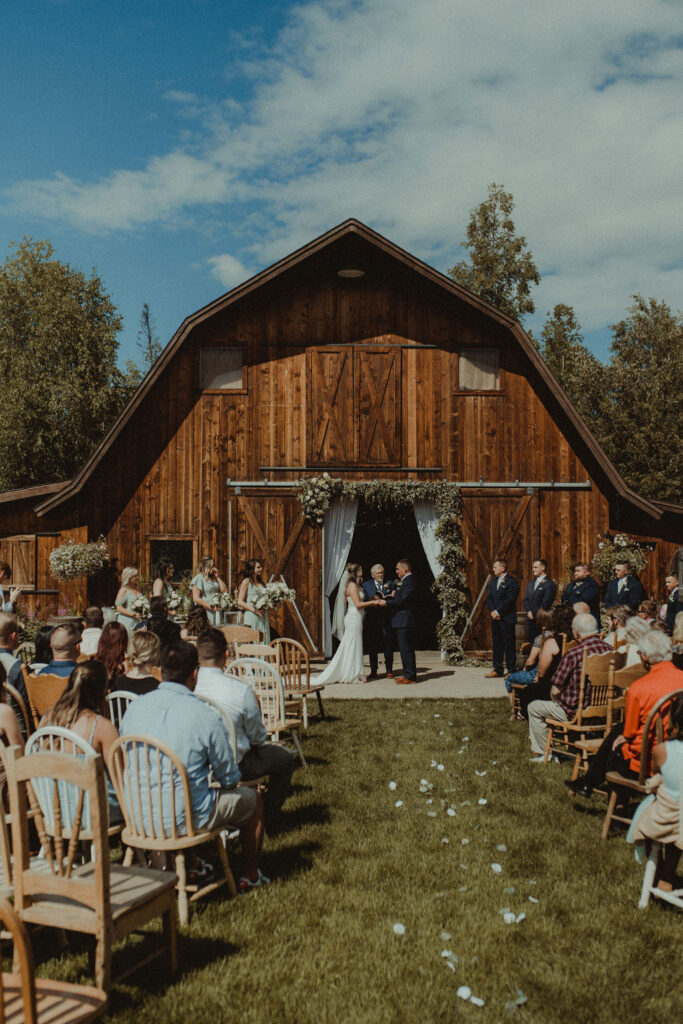 couple at their rustic modern wedding ceremony 