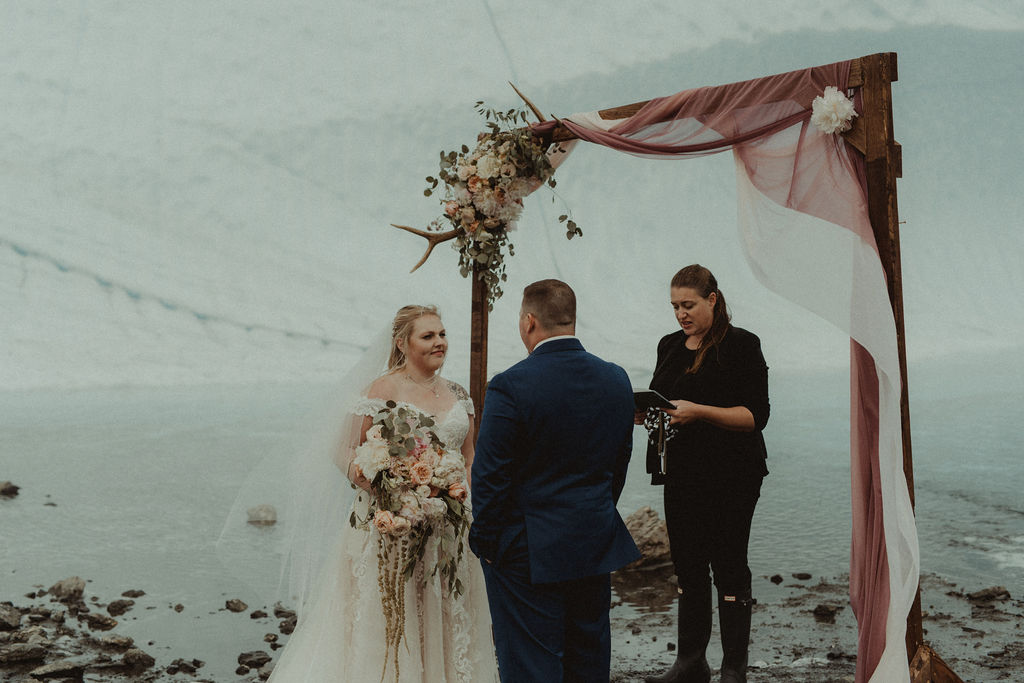 couple at their epic alaskan elopement ceremony
