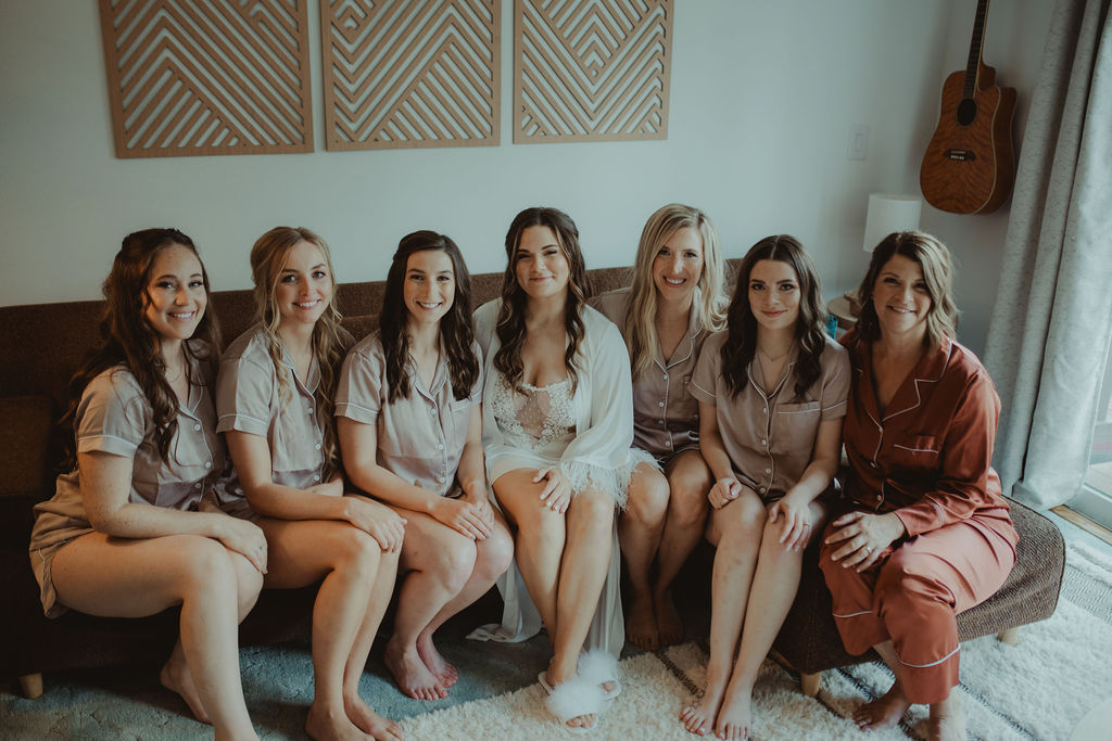 bride and her friends before getting ready for her wedding ceremony