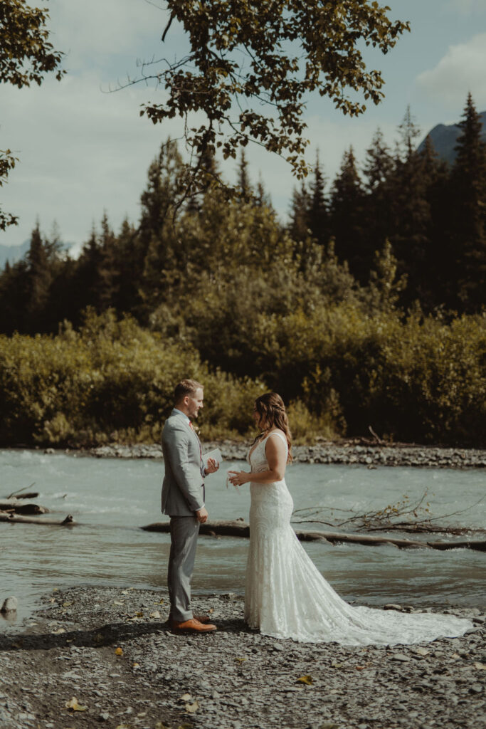 bride and groom holding hands