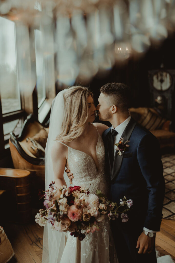 bride and groom looking at each other 