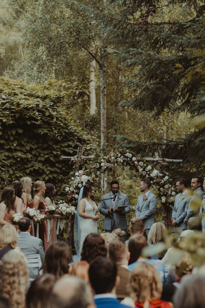 bride and groom at their fun summer wedding ceremony