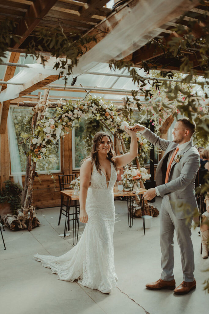 bride and groom dancing at their wedding reception