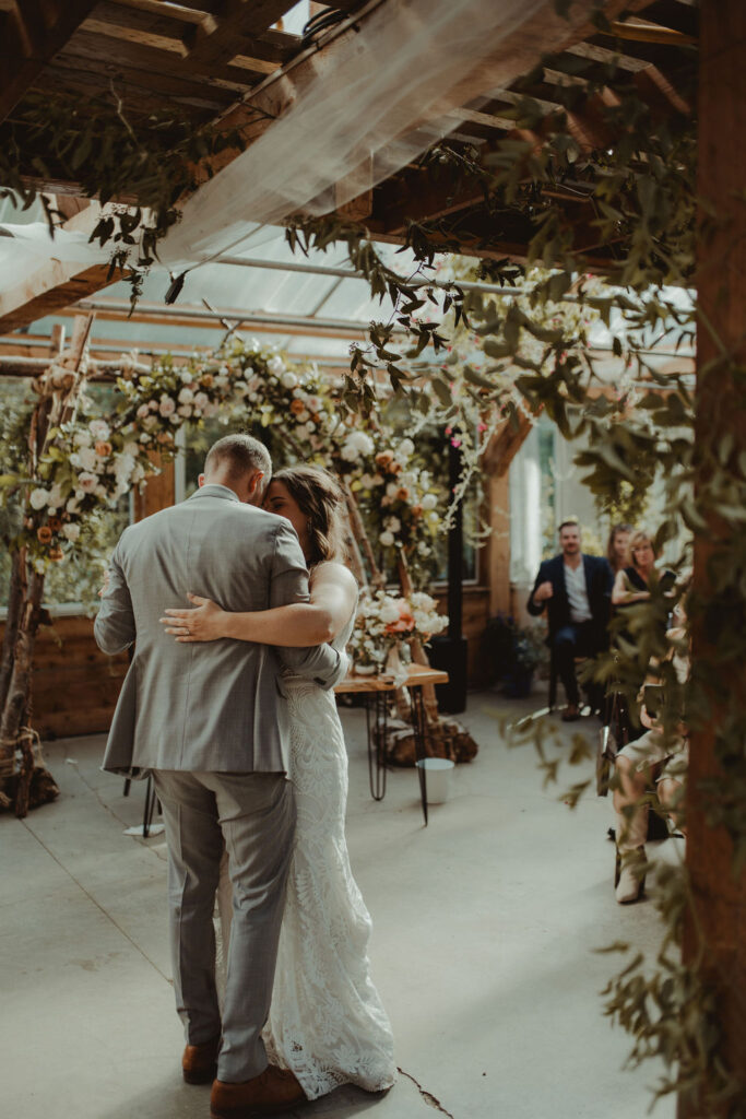 bride and groom dancing at their wedding reception