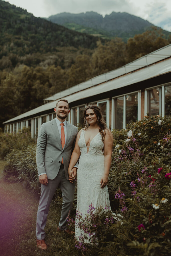 bride and groom holding hands