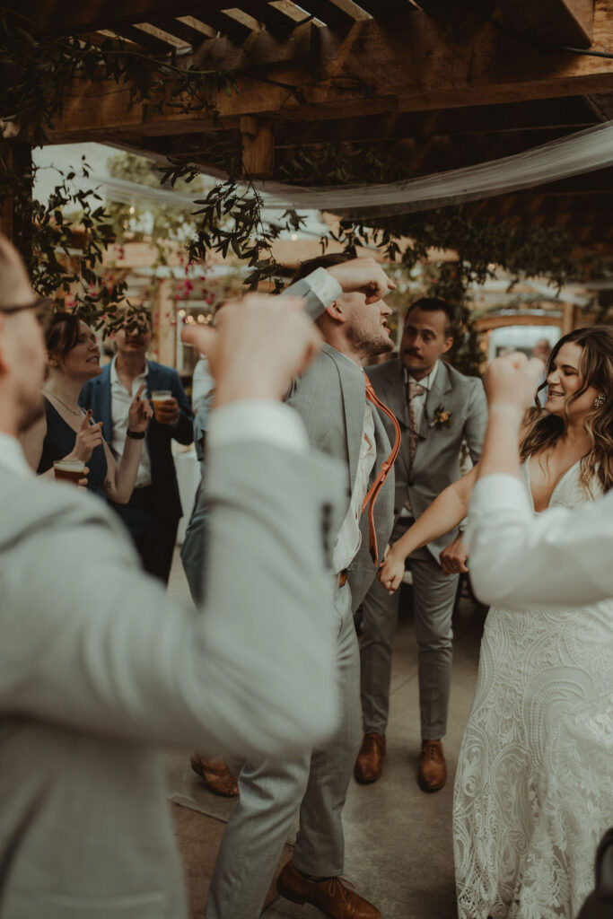 bride and groom dancing at their wedding reception