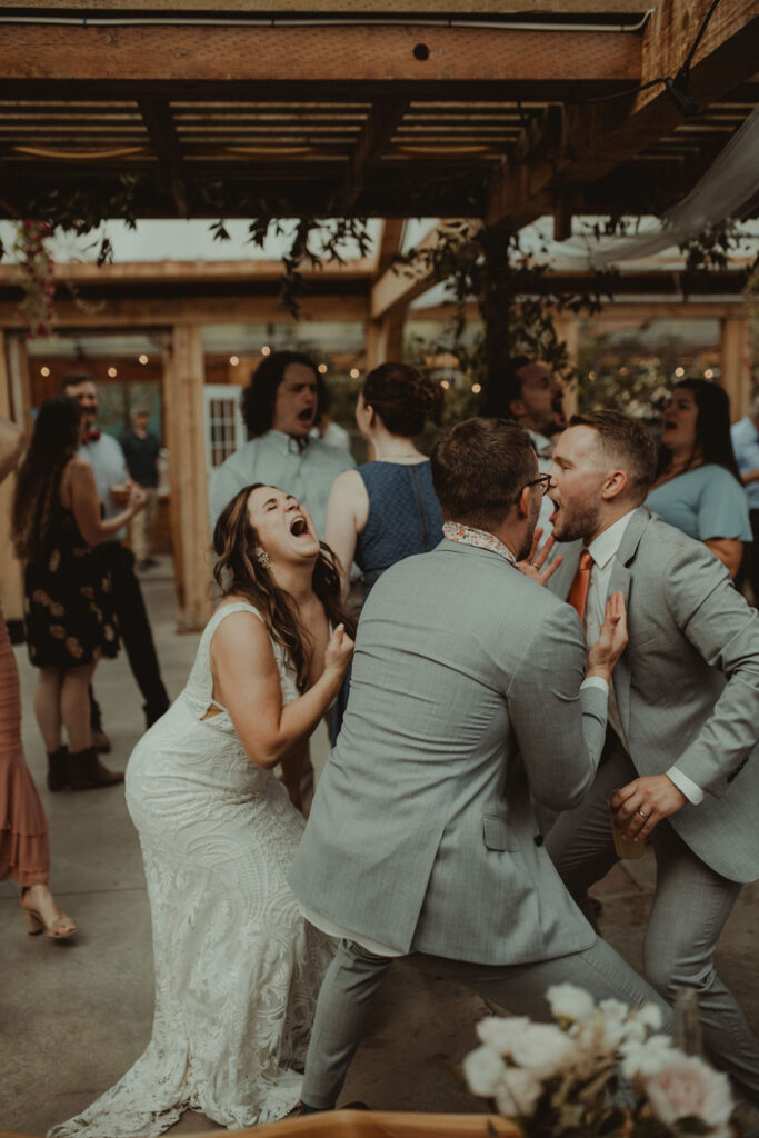 bride and groom dancing at their fun summer wedding