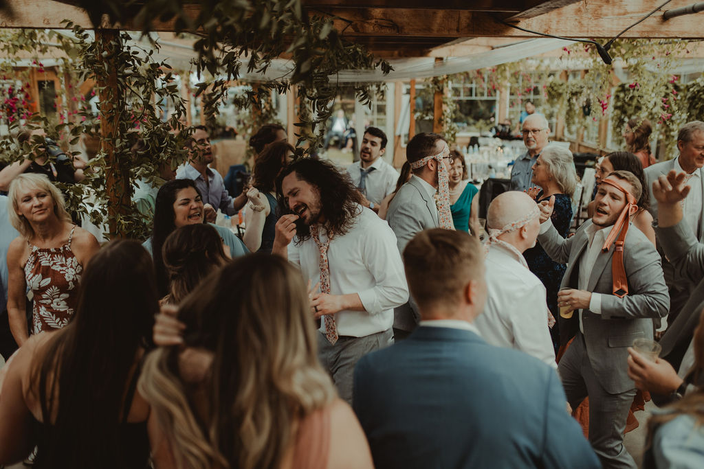 guests dancing at the fun summer wedding