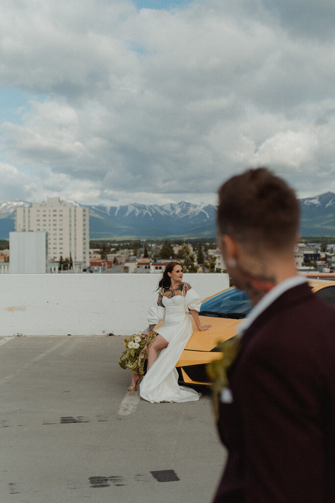 groom looking at the bride