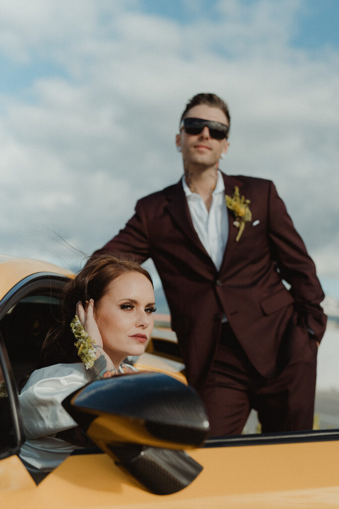 bride and groom posing for the camera