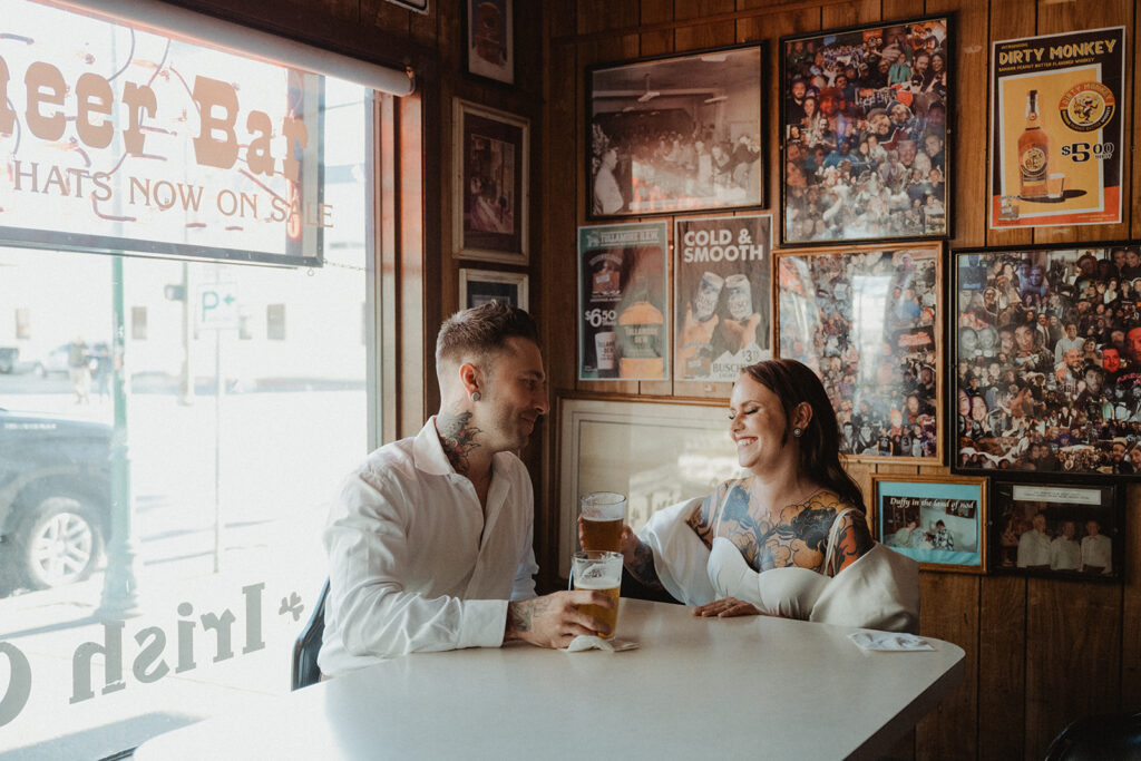 bride and groom at a bar