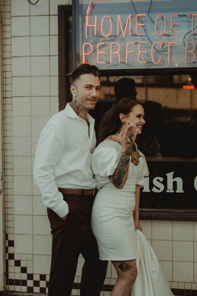 bride and groom laughing