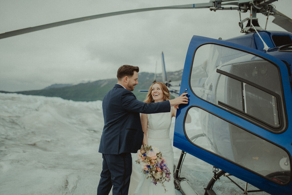 bride and groom Add a Helicopter for Your Alaska Elopement