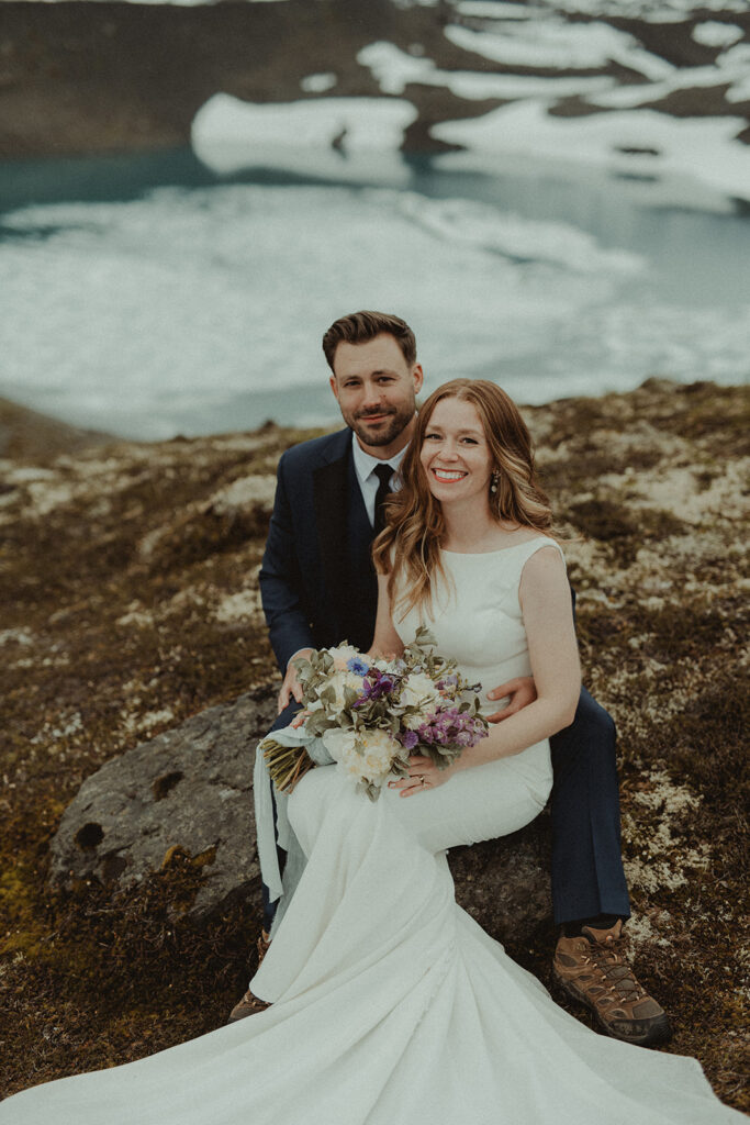 bride and groom posing for the camera