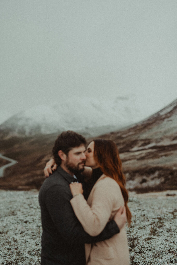 couple at their winter session in alaska