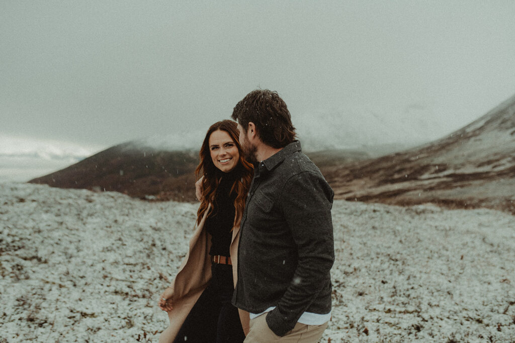 couple holding hands during their winter couple shoot