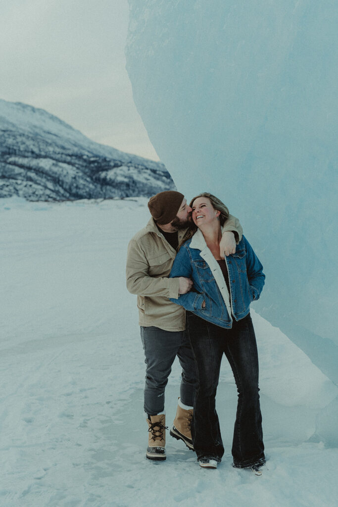 happy couple at their winter engagement session