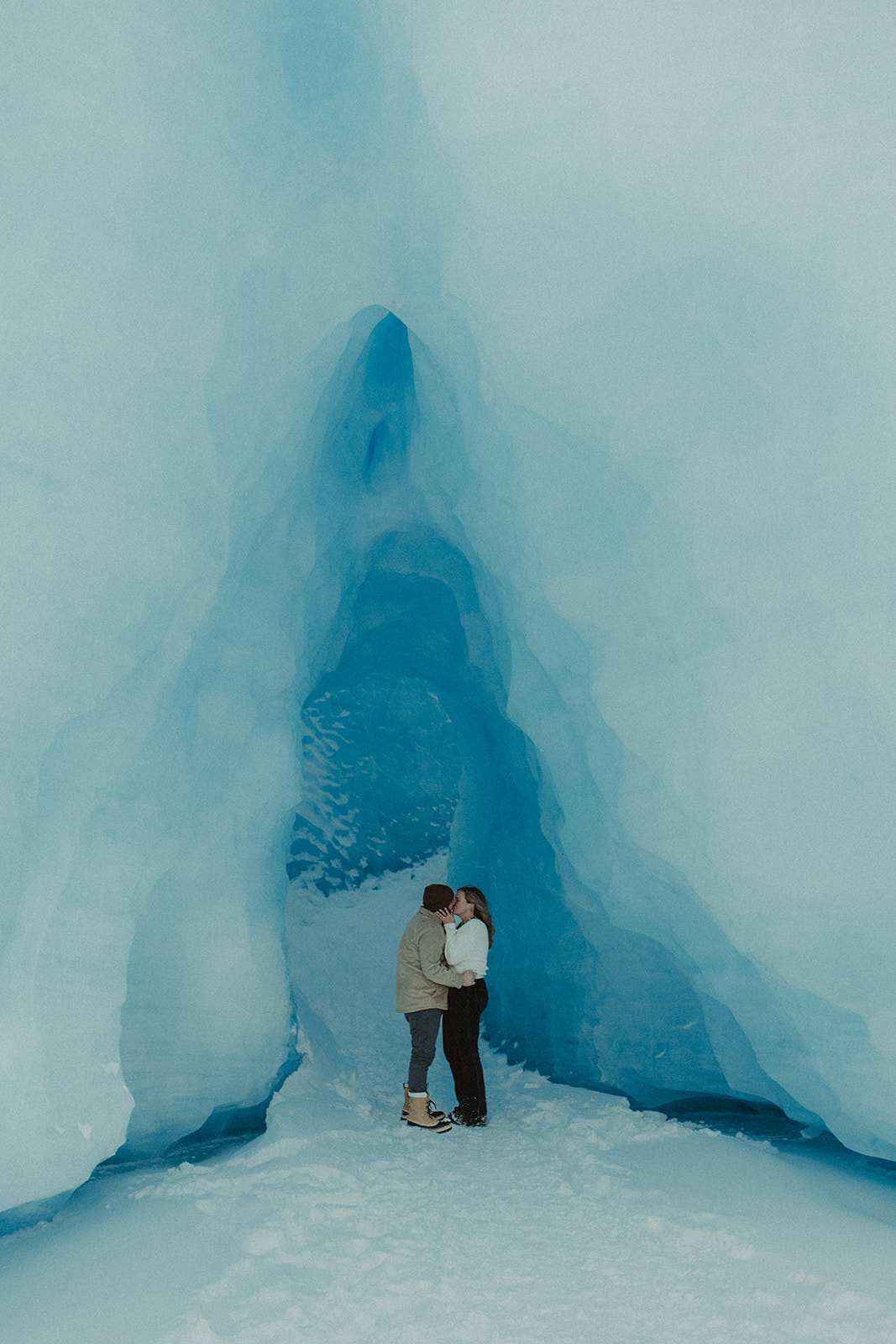 couple kissing during their engagement photoshoot