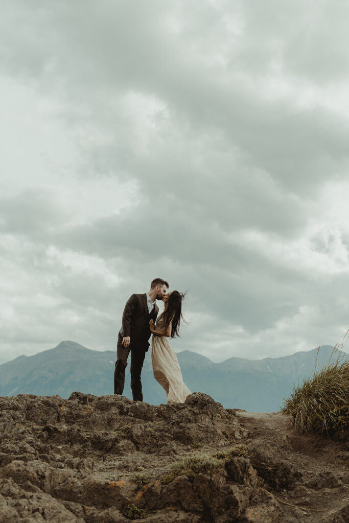 couple kissing during their engagement photoshoot