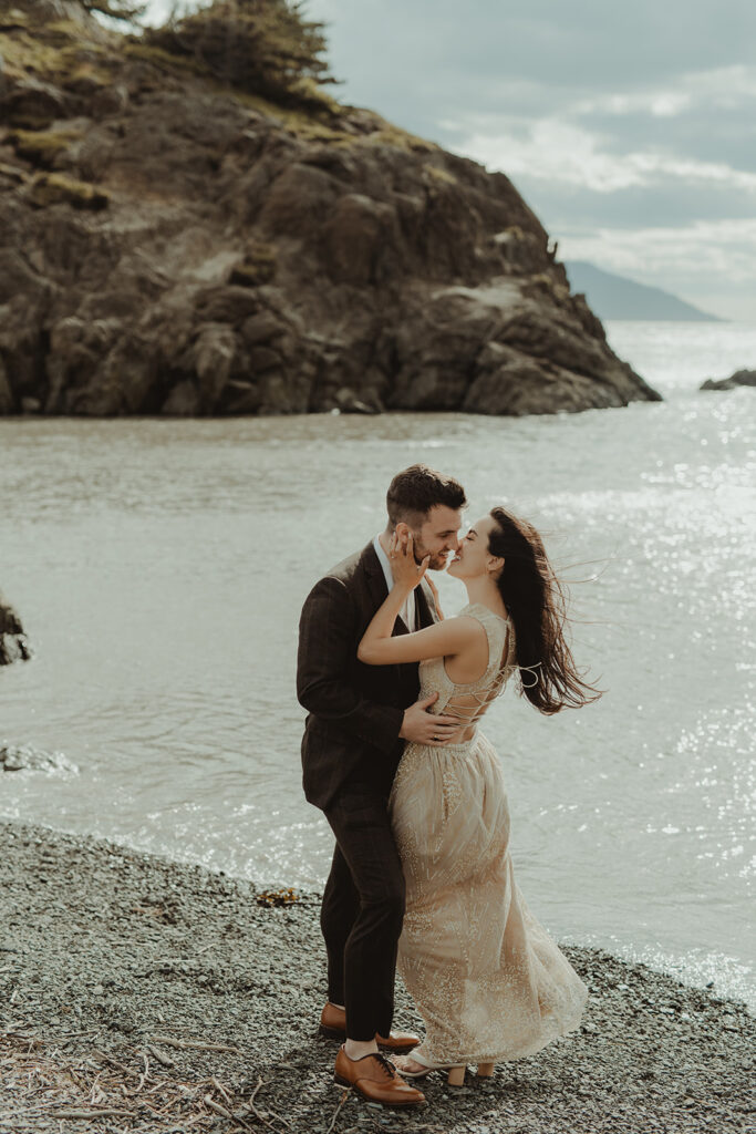 newly engaged couple kissing during their photoshoot