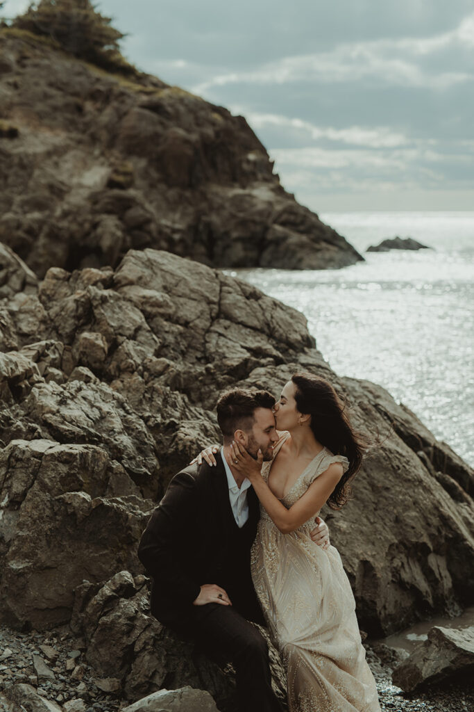 fiance kissing her fiance on the forehead 