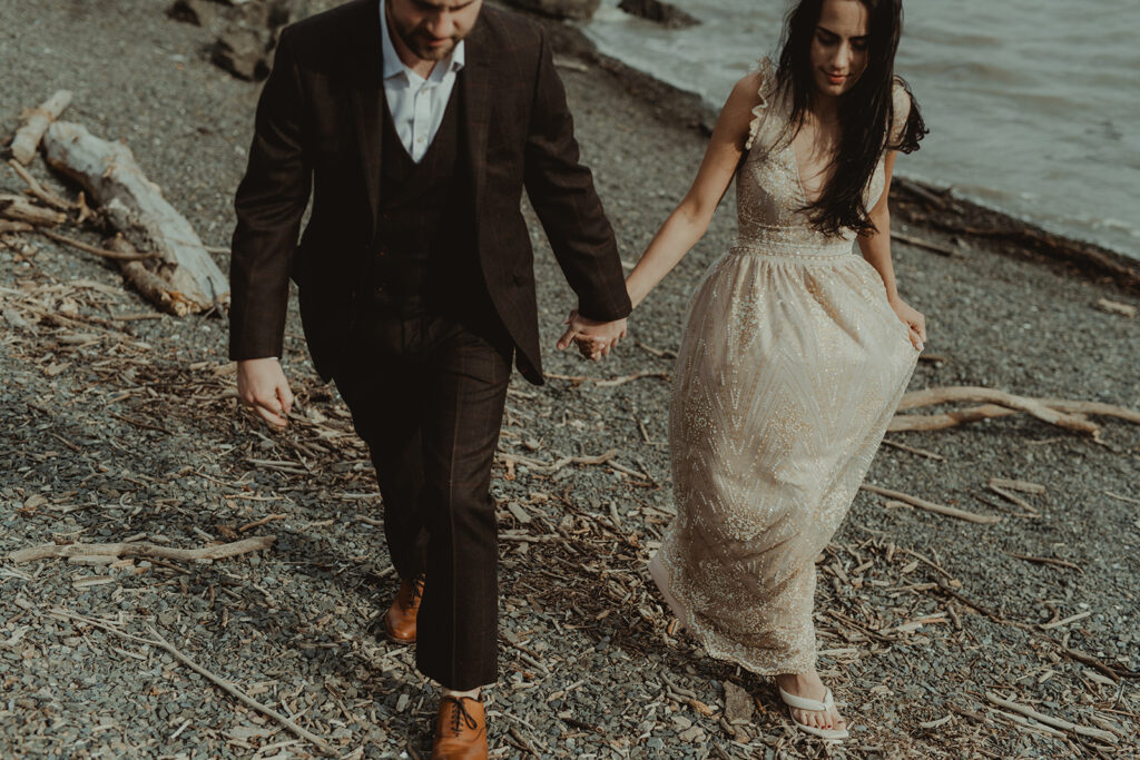 couple holding hands during their engagement photoshoot