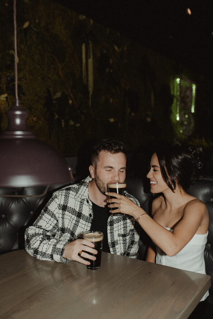 couple drinking ice coffee during their photoshoot