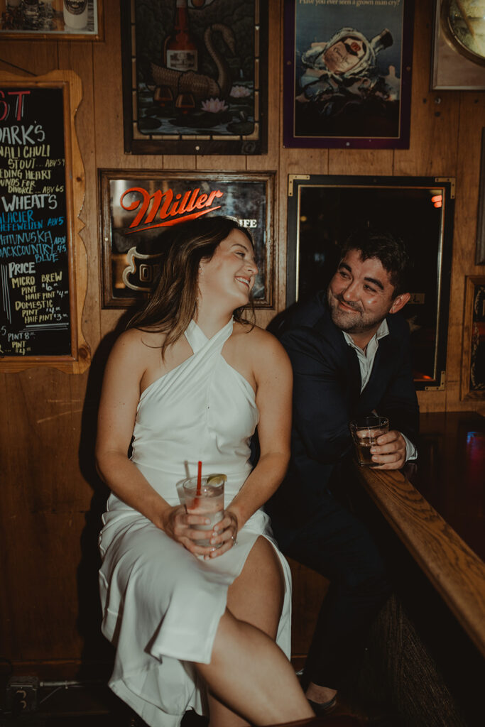 cute couple looking at each other during their photoshoot