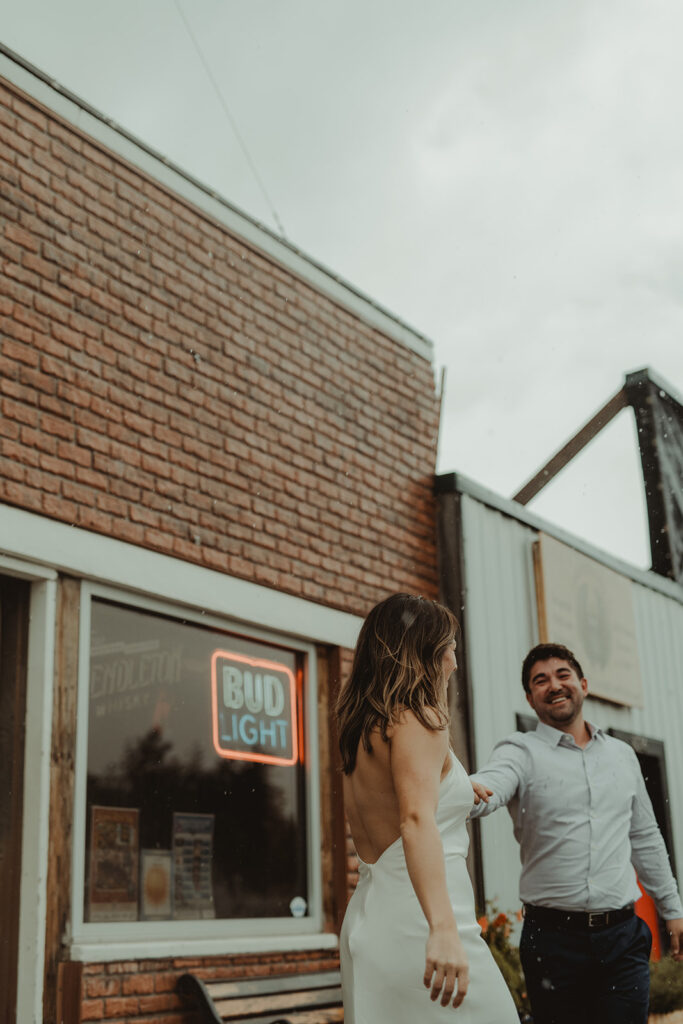 couple dancing at their chic engagement session