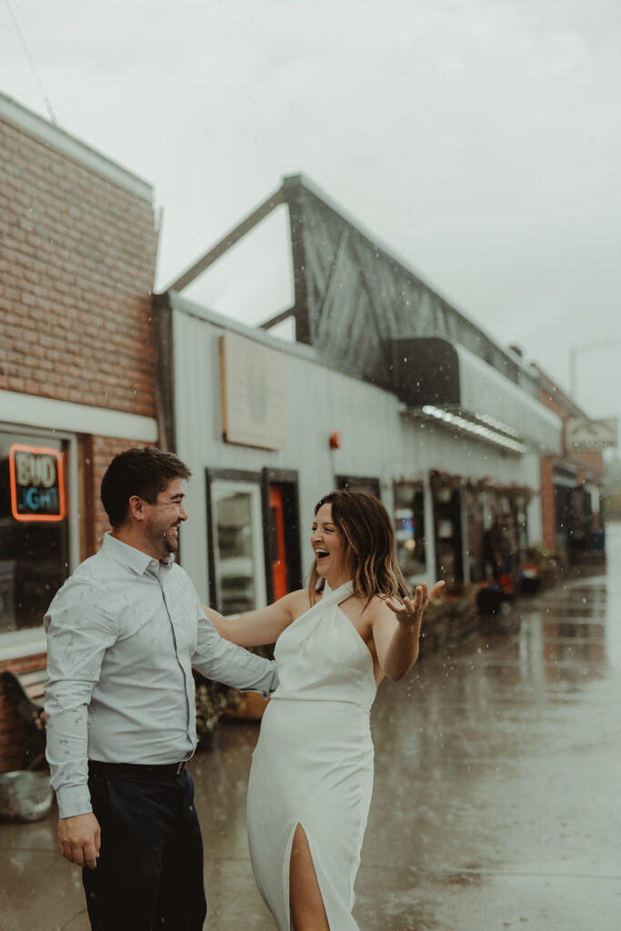 couple laughing with each other 