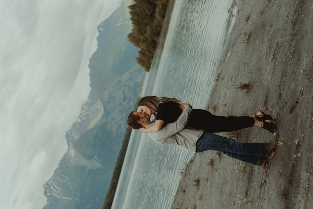 couple kissing at their family photoshoot