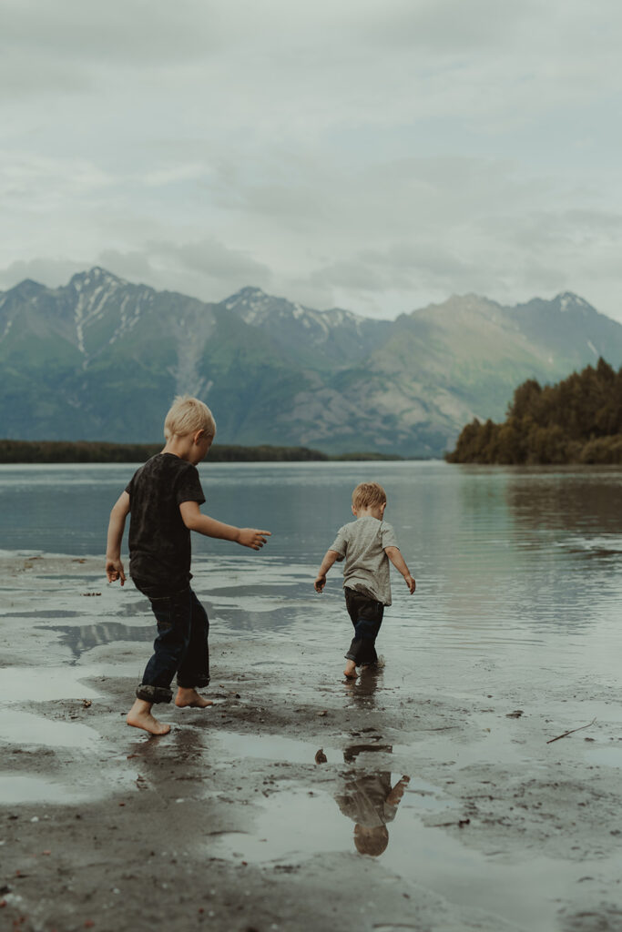 siblings playing during their photoshoot