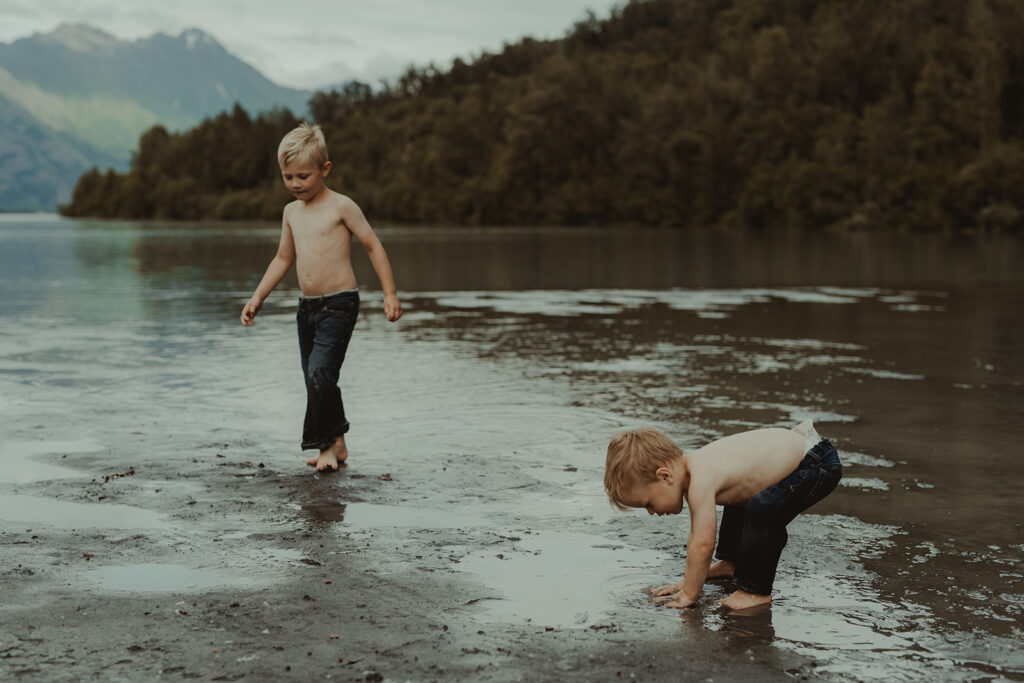 sibling having fun during their family photoshoot in alaska