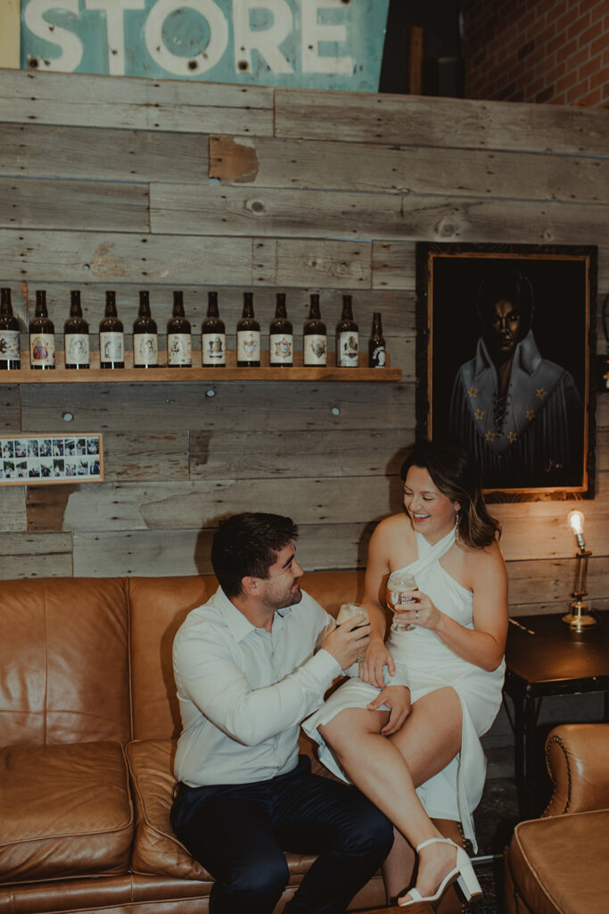 couple drinking their favorite coffee during their chic engagement session