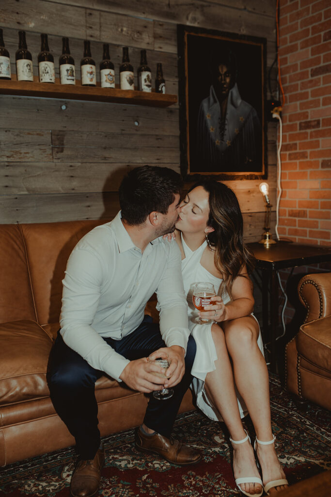 happy couple kissing during their session