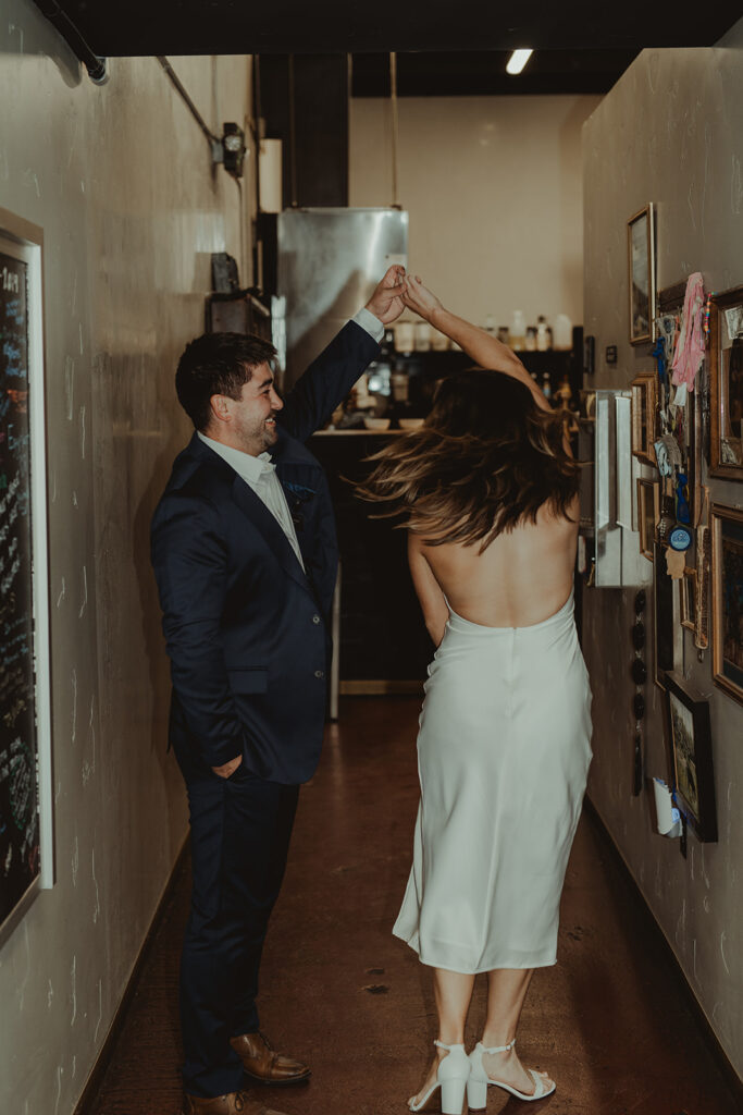 couple dancing during their chic engagement session