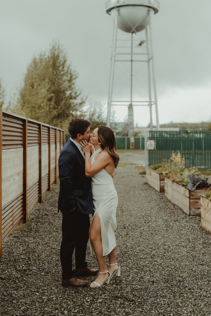 happy newly engaged couple kissing 