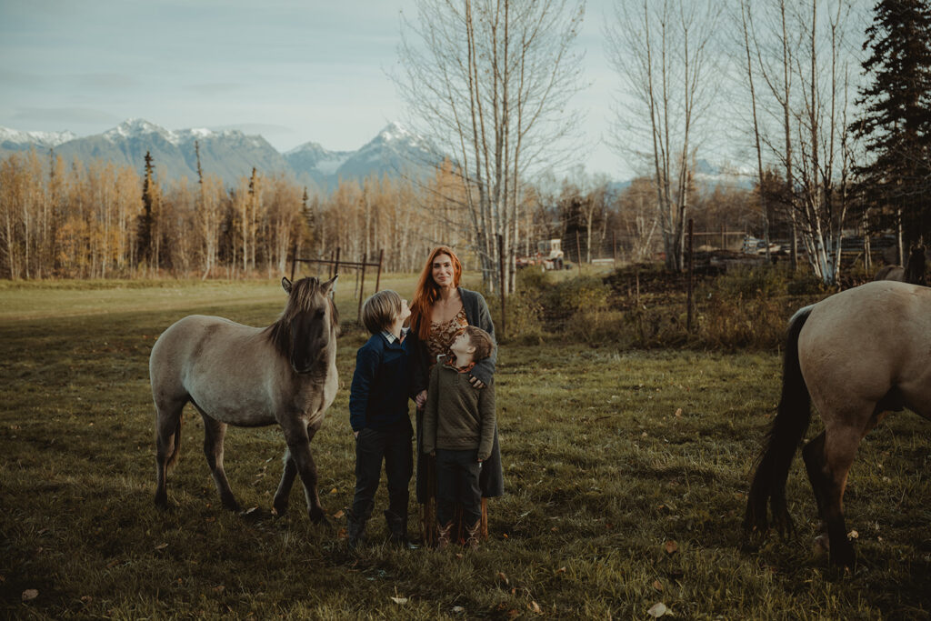 family laughing during their sunrise family photoshoot