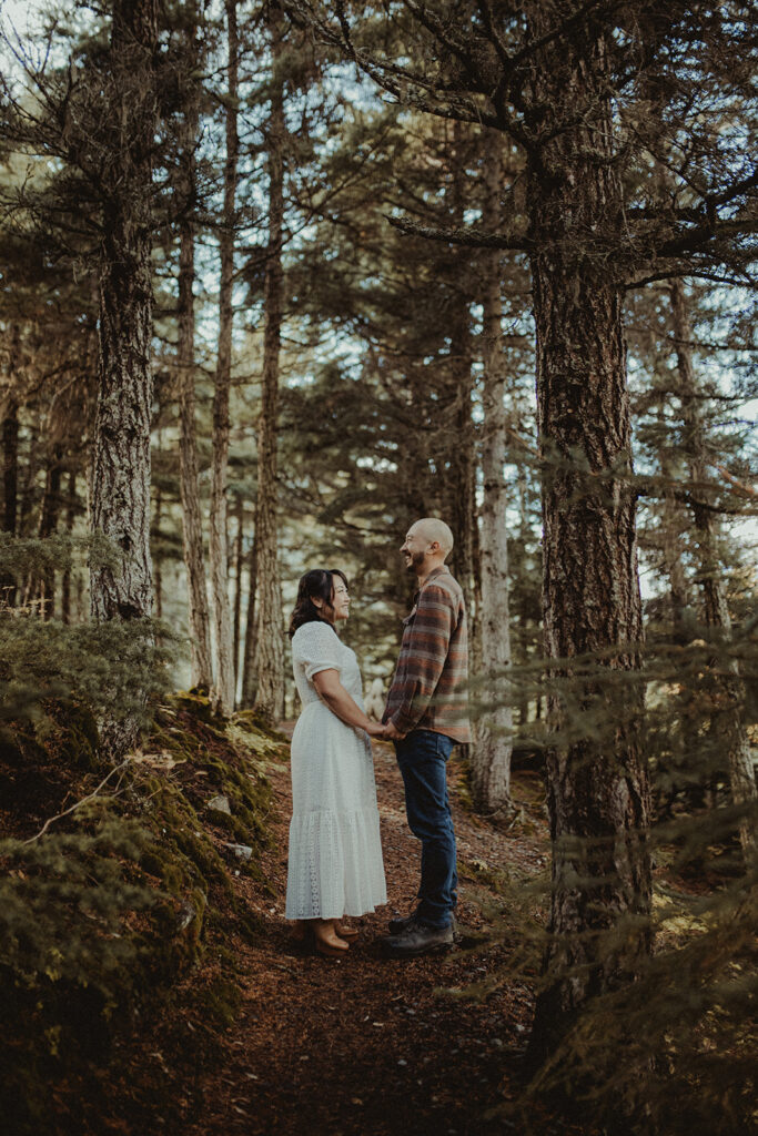 cute couple looking at each other during their photoshoot