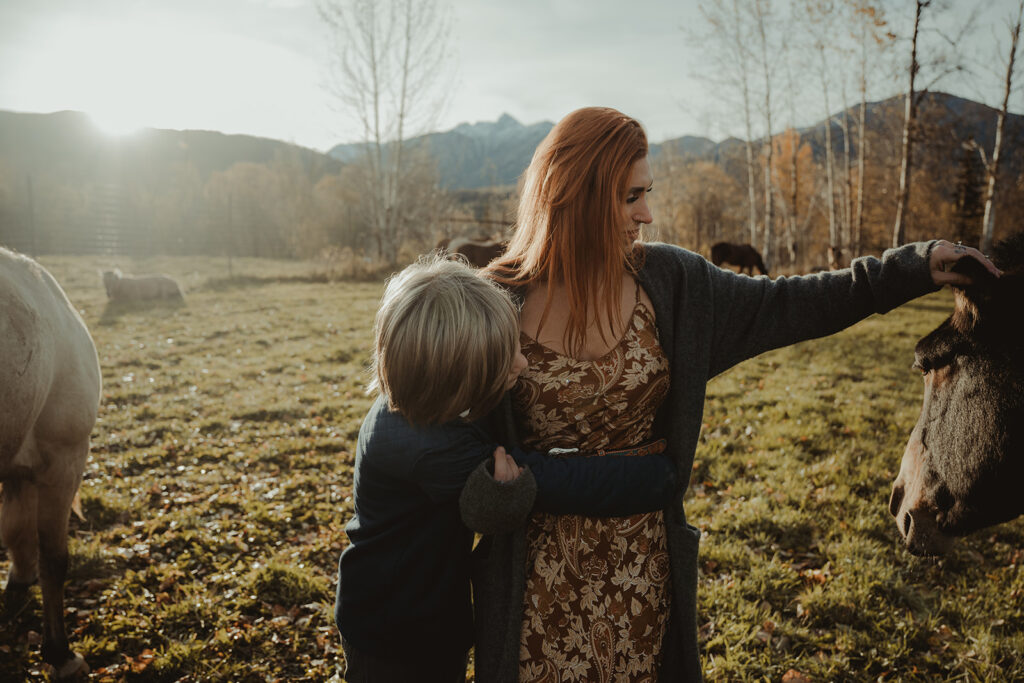 mom hugging her son during their family session