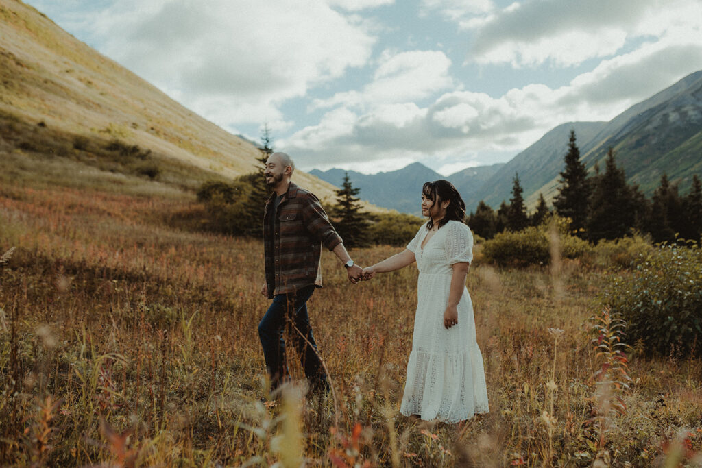 cute couple holding hands during their engagement session